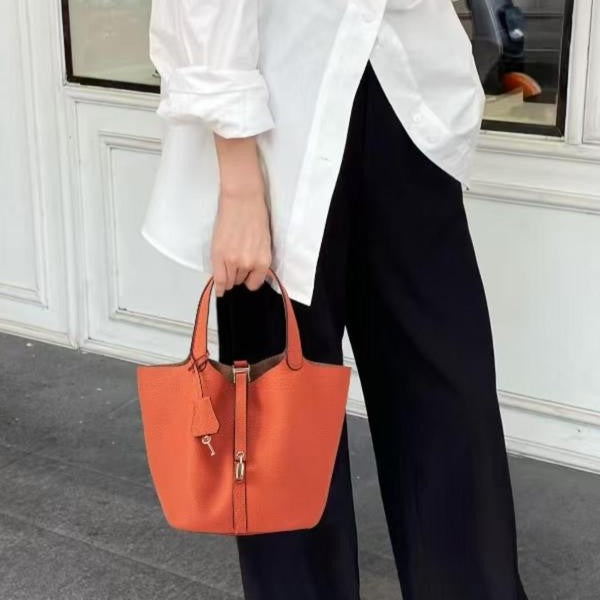 Katevault™ – Compact Lock Handbag (50% Off)